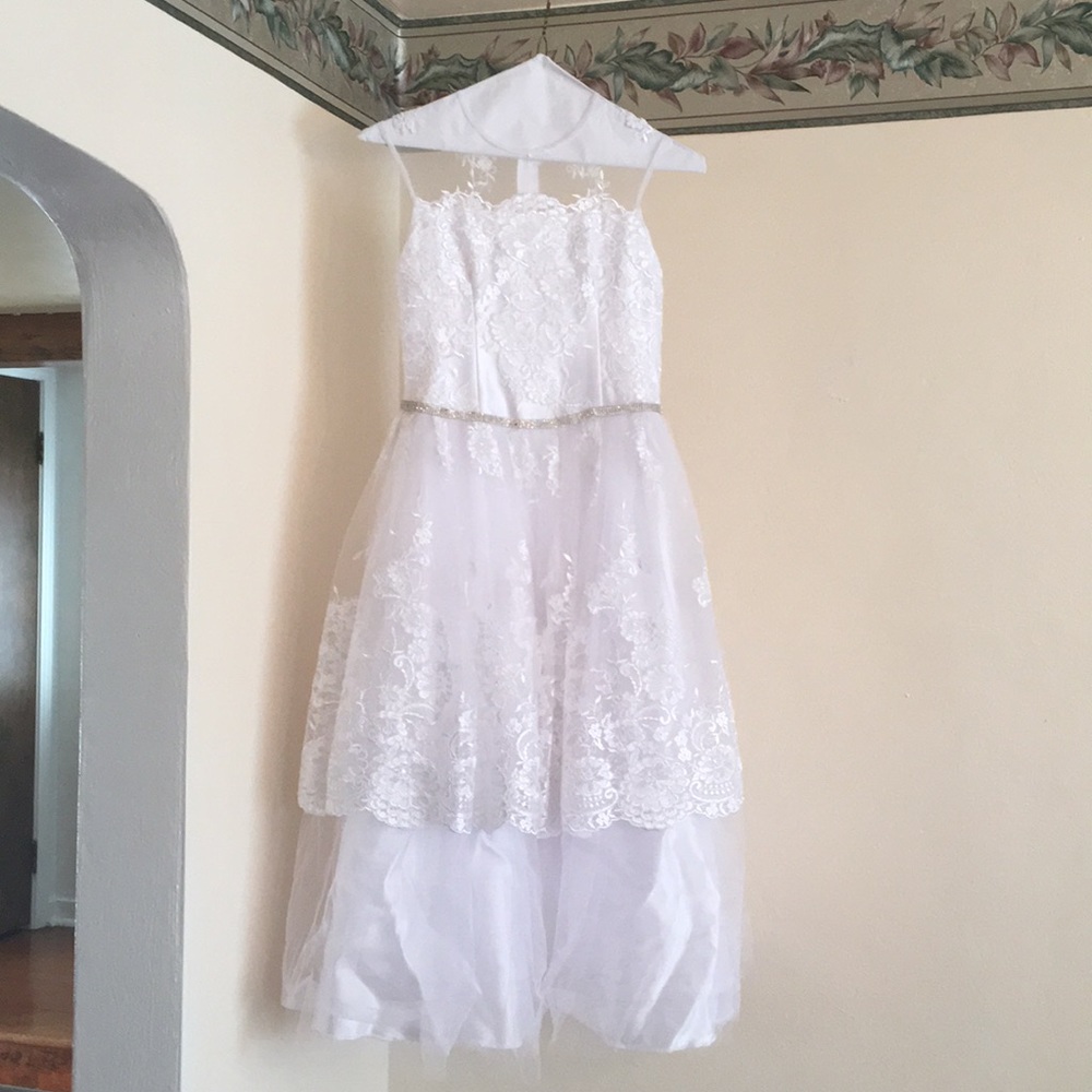 Communion.Worn once. Three Rhinestones Missing.